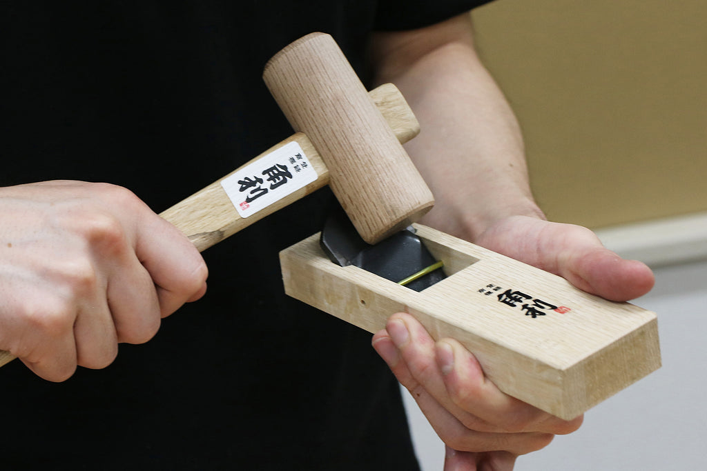 User-friendly Japanese woodworking tools including a wooden mallet and a hand plane, showcasing precision and ease of use for all skill levels.